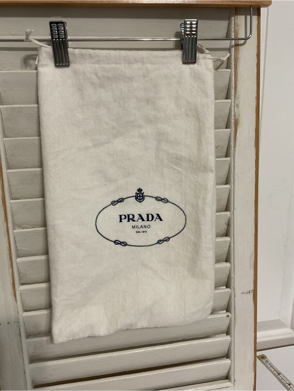 Prada Cream Dust Bag with Navy Logo